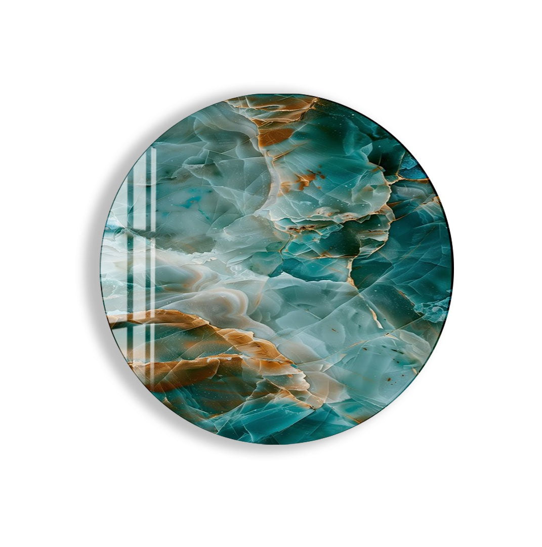 a large oval-shaped piece of art with a vibrant, abstract design. The design is a mix of blue, green, and orange colors, creating a visually striking and dynamic composition.