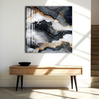 a modern interior design with a large abstract painting hanging on the wall above a wooden console table.
