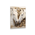 A decorative wall panel featuring two white horse heads with floral elements surrounding them.