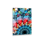 The image is a vibrant and colorful abstract artwork composed of various geometric shapes and patterns, including triangles, rectangles, and circles, arranged in a visually striking manner.