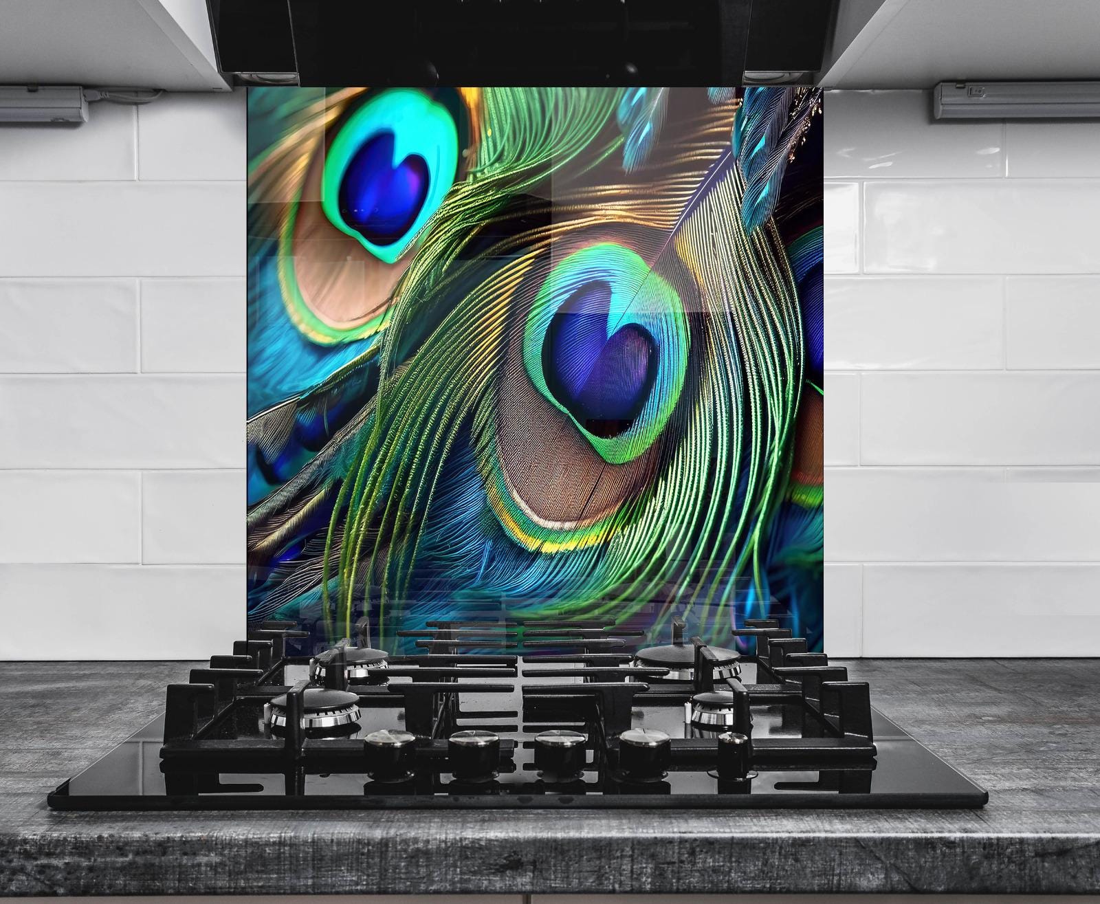 a large, colorful, and intricate image of peacock feathers displayed on a wall.