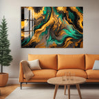 a modern living room with a large abstract painting hanging on the wall above a cozy orange sofa. The painting has a vibrant mix of green, yellow, and black colors, creating a striking visual effect. In front of the sofa, there is a wooden coffee table with a glass top, and a potted plant is placed on the floor next to the sofa.