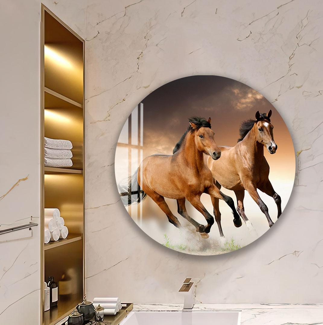 A large round mirror in a bathroom, with a close-up of two leopards' faces on its surface.