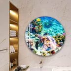 A large circular wall art depicting a colorful underwater scene with a sea turtle swimming among vibrant coral and marine life.