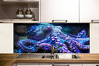 a kitchen with an octopus mural on the wall
