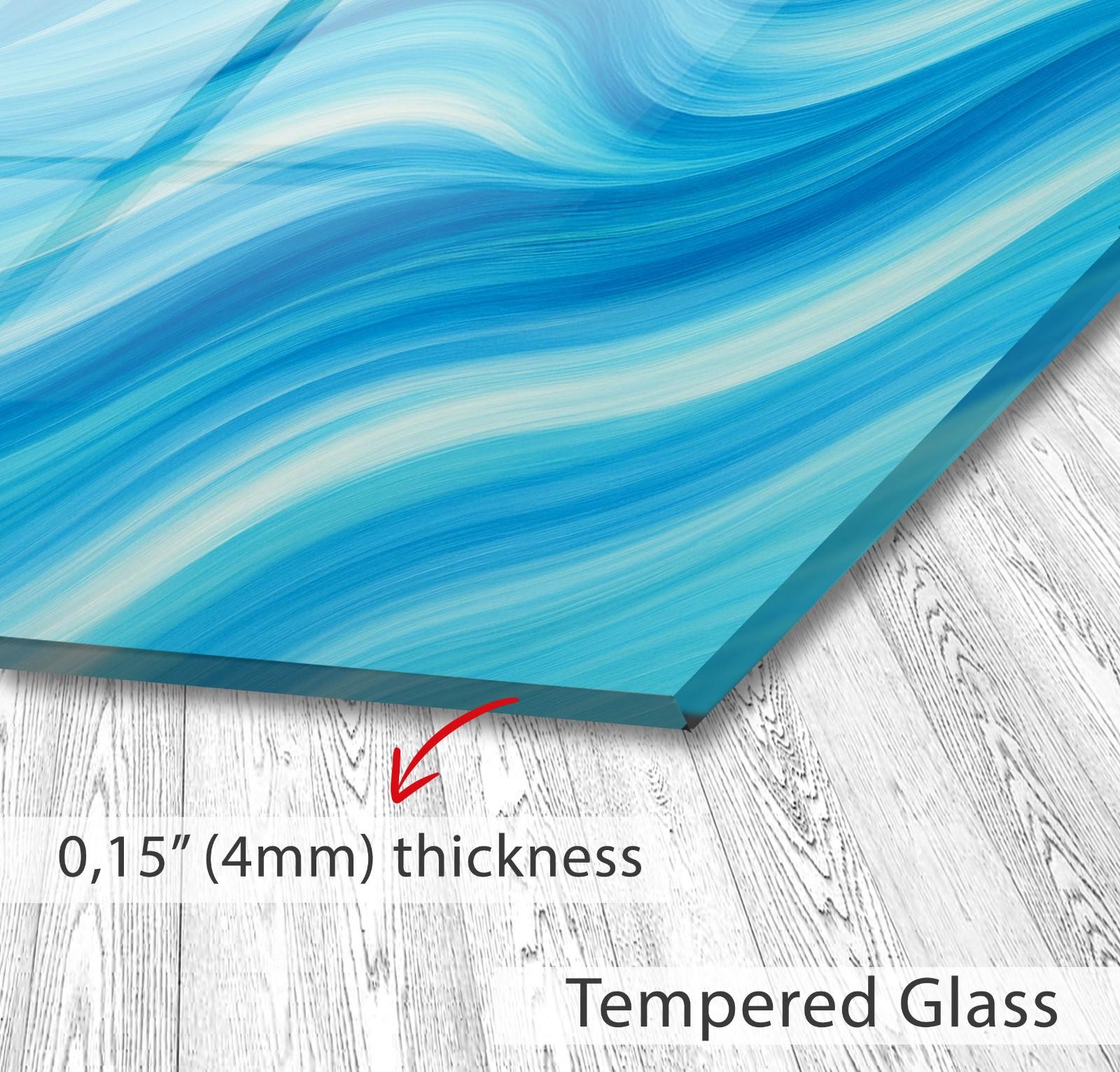 a blue and white painting on a wooden floor