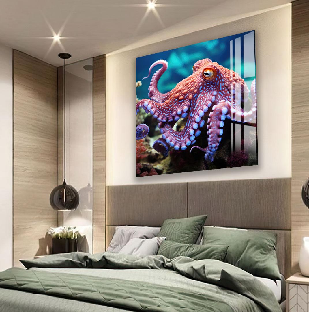 a serene bedroom scene with a large bed adorned with green bedding and pillows. Above the bed, a large framed artwork features a tranquil scene of butterflies resting on a bed of flowers. The room is well-lit, with a pendant light hanging from the ceiling and a window providing natural light.