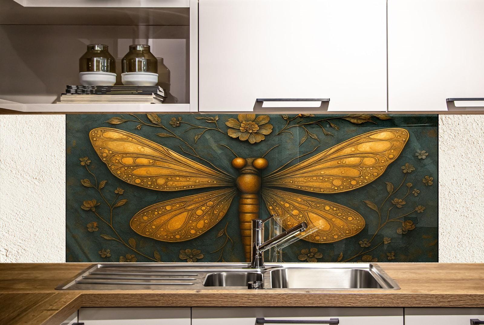 a kitchen with a large, detailed butterfly mural on the wall behind the sink. The butterfly has golden wings and is surrounded by green leaves and flowers. The kitchen has white cabinets and a wooden countertop.