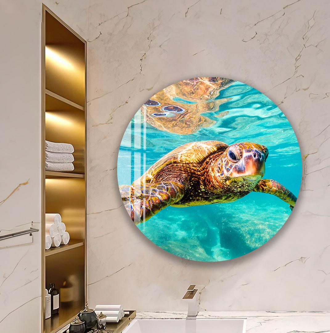 a large, detailed photograph of an elephant's face, which is prominently displayed on the wall in a bathroom setting.