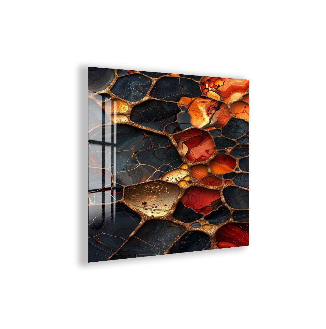 The image is a vibrant abstract artwork featuring a striking pattern of overlapping and interlocking shapes in shades of orange, black, and red.