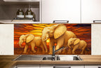 a painting of three elephants on a kitchen backsplash
