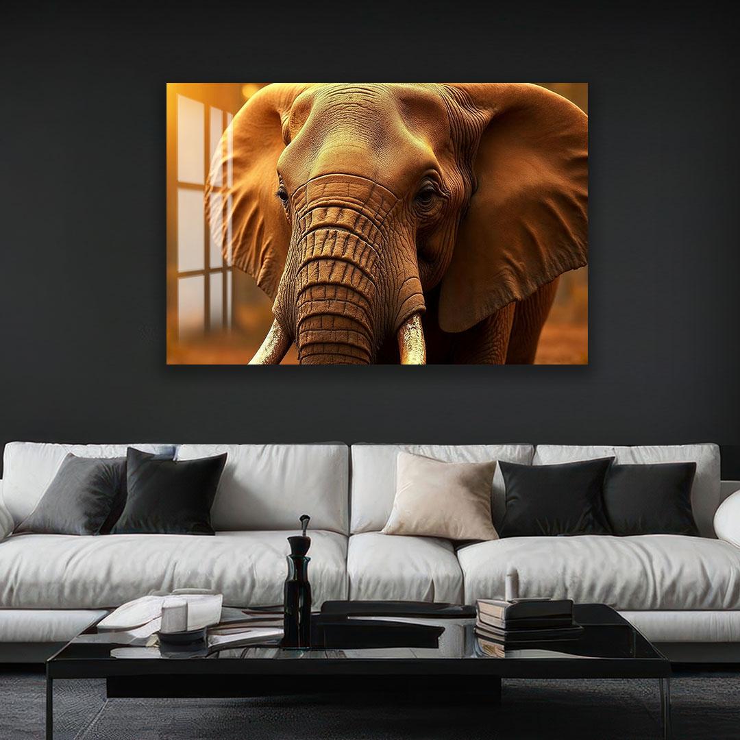 a large, detailed photograph of an elephant's face, mounted on a wall above a modern, minimalist living room setting with a white sofa and a glass coffee table.