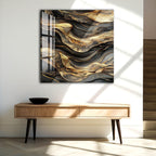 a modern art piece with a striking abstract design, hanging on a white wall above a wooden console table.