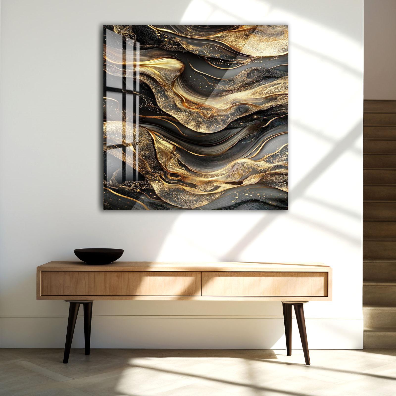 a modern art piece with a striking abstract design, hanging on a white wall above a wooden console table.