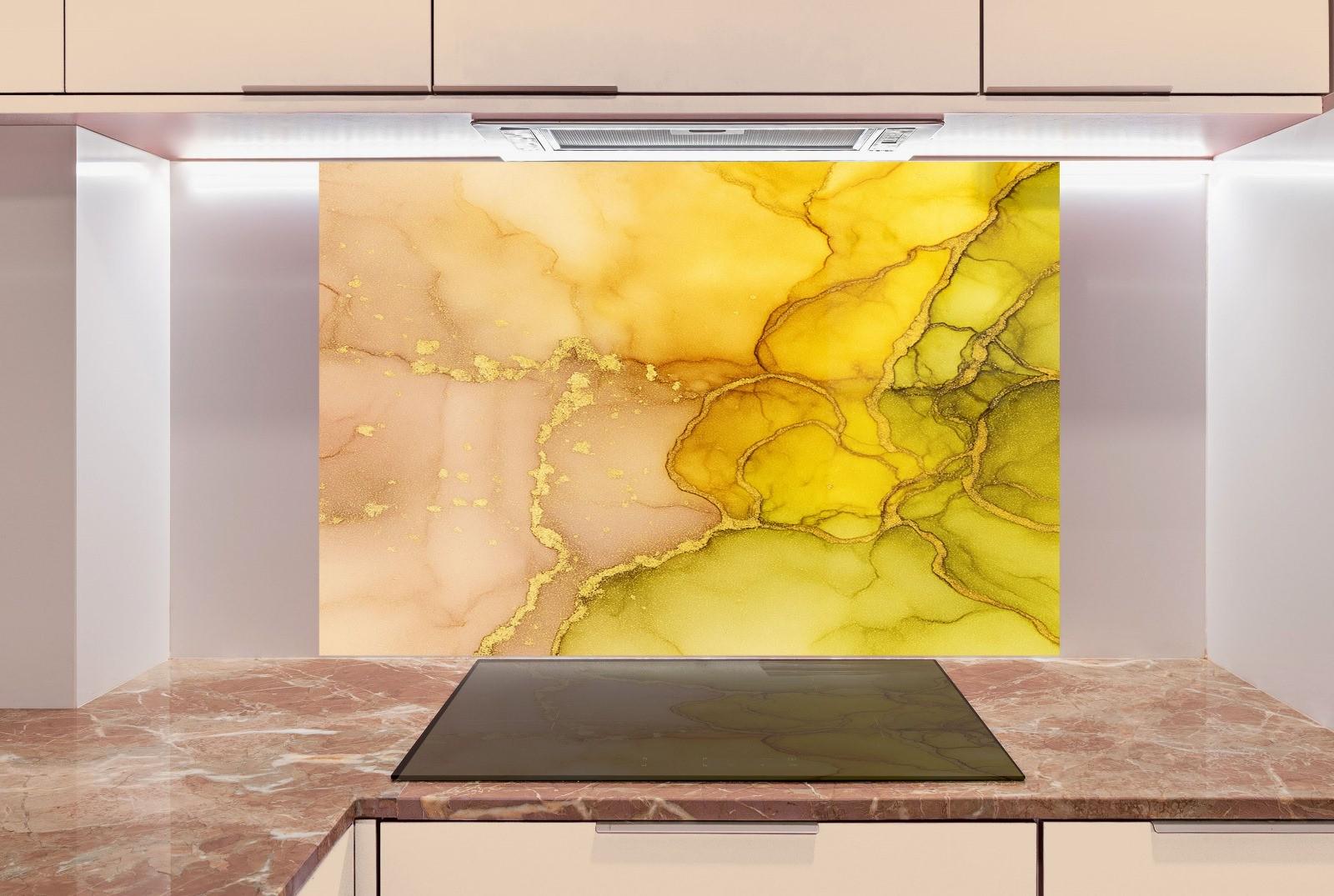 a kitchen with marble counter tops and a painting on the wall