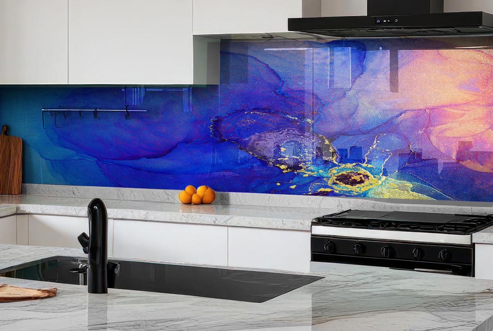 a modern kitchen with a striking blue and purple abstract mural on the wall behind the stove. The kitchen has white cabinets and a black oven, creating a clean and contemporary look. On the countertop, there are a few oranges and a wooden cutting board.