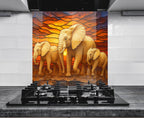 a painting of three elephants on a wall