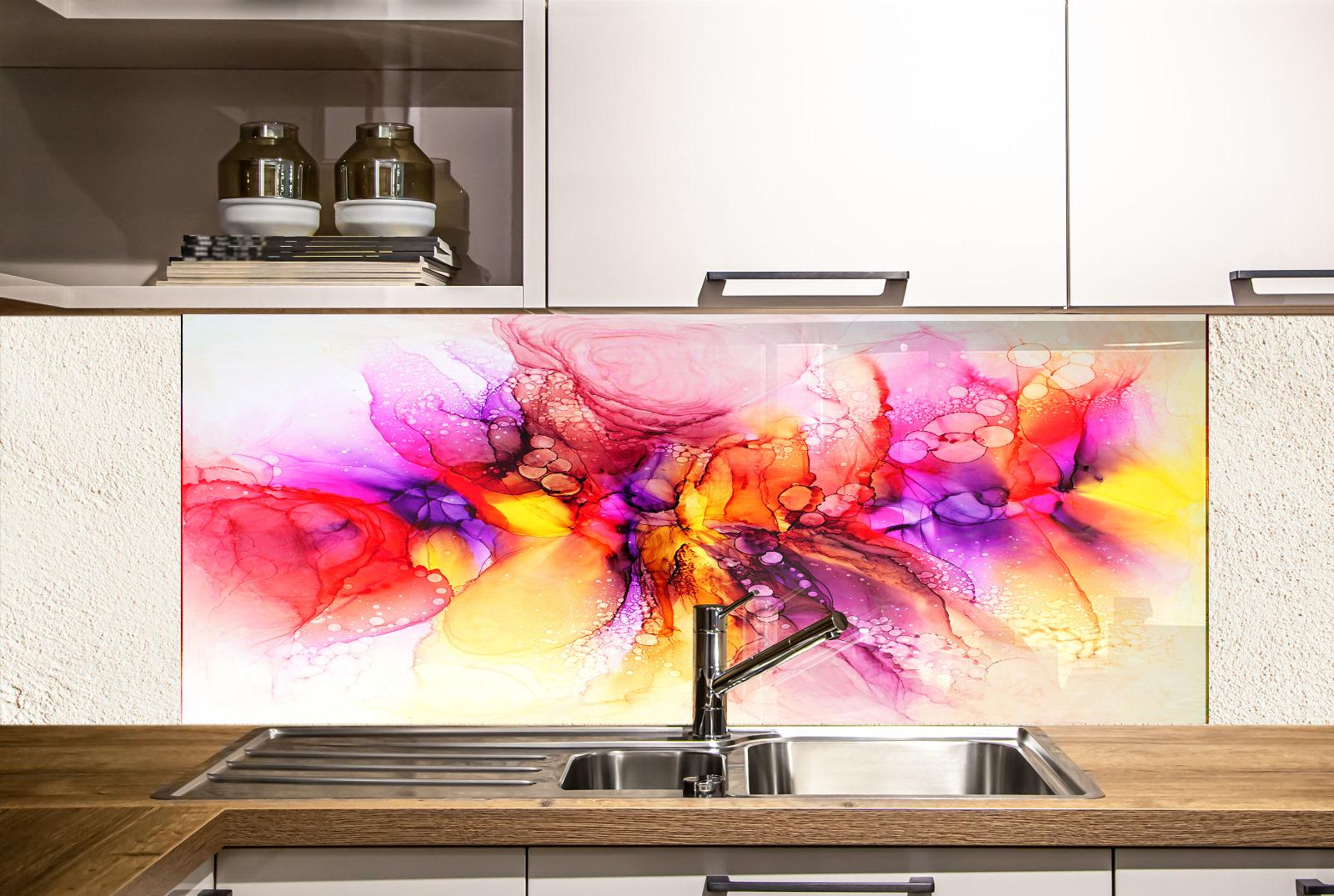 a kitchen with a colorful abstract painting on the wall behind the sink. The painting has a vibrant mix of pink, orange, yellow, and purple colors, creating a lively and energetic atmosphere in the kitchen.