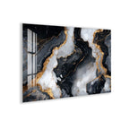 a striking abstract design with a combination of black, white, and gold colors. The design appears to be a marble-like pattern with swirling lines and shapes, creating a sense of depth and movement. The overall composition is visually captivating and draws the viewer's attention to the intricate details and patterns within the artwork.