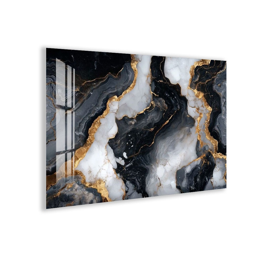 a striking abstract design with a combination of black, white, and gold colors. The design appears to be a marble-like pattern with swirling lines and shapes, creating a sense of depth and movement. The overall composition is visually captivating and draws the viewer's attention to the intricate details and patterns within the artwork.