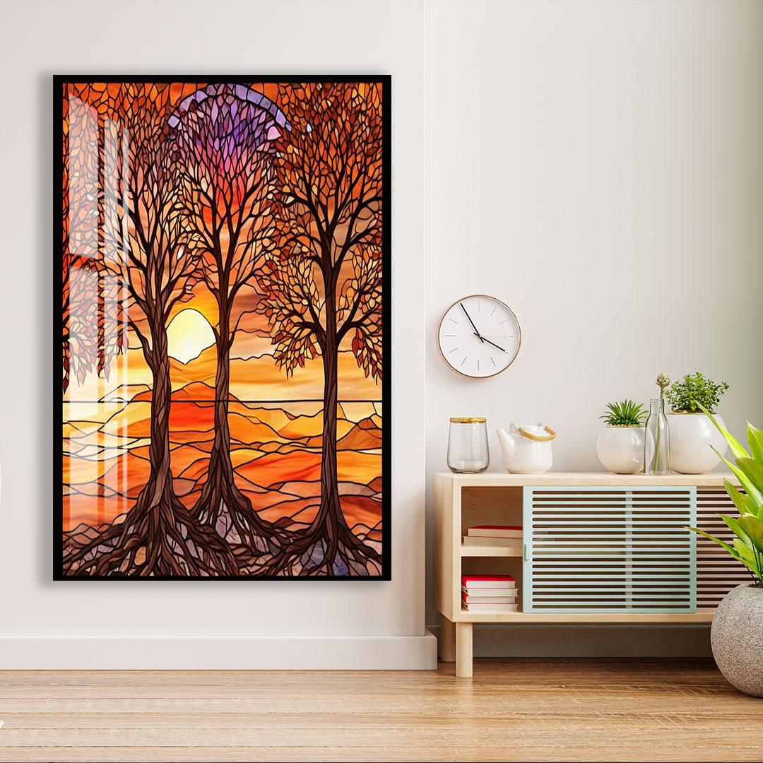 a large, colorful stained glass artwork depicting a serene landscape with trees and a sunset. The artwork is mounted on a wall next to a wooden cabinet with a clock and some decorative items.