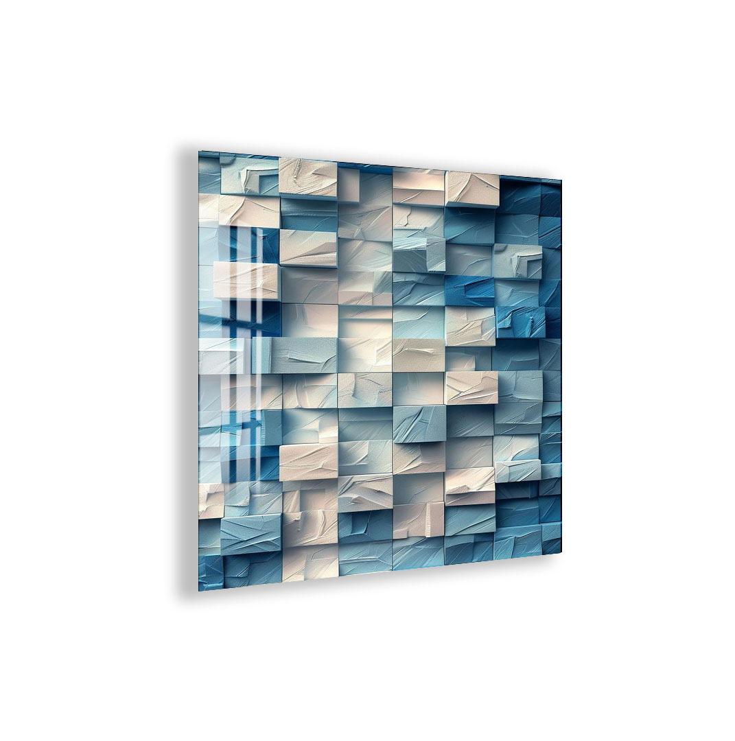 The image is a modern art piece featuring a geometric pattern of blue and white cubes or blocks arranged in a visually striking and abstract manner.