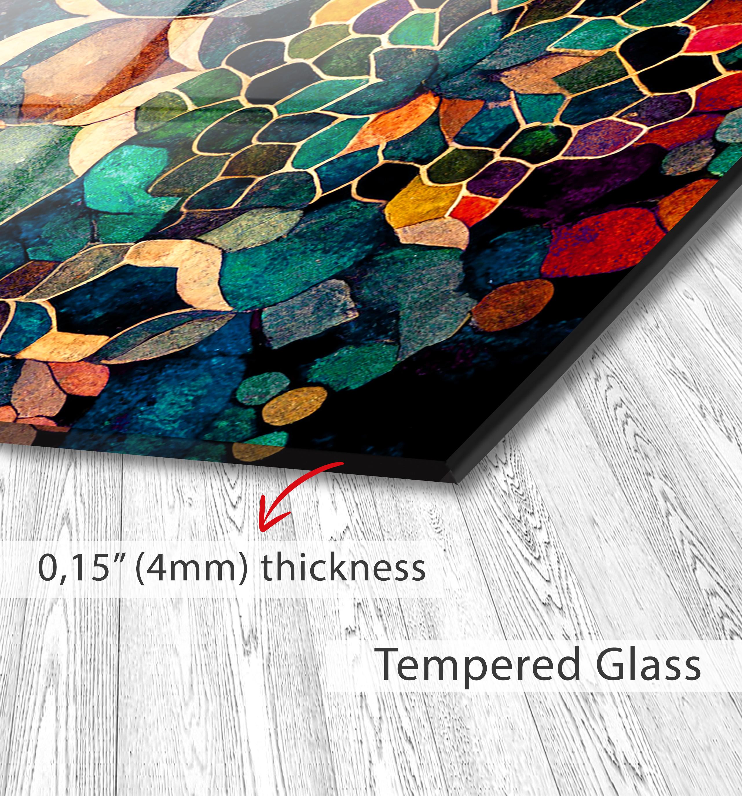 a close up of a piece of art on a wooden floor