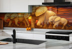 a kitchen with a painting of two elephants and a baby elephant