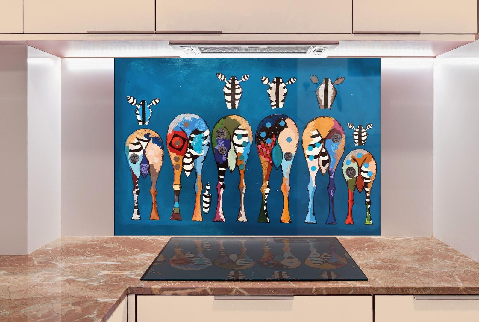 a vibrant and colorful abstract painting of various animal shapes and patterns, including zebras, giraffes, and elephants, displayed on a wall above a kitchen counter.