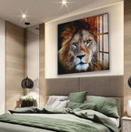 a large, high-quality photograph of a lion's face displayed on the wall above a bed with a green comforter.