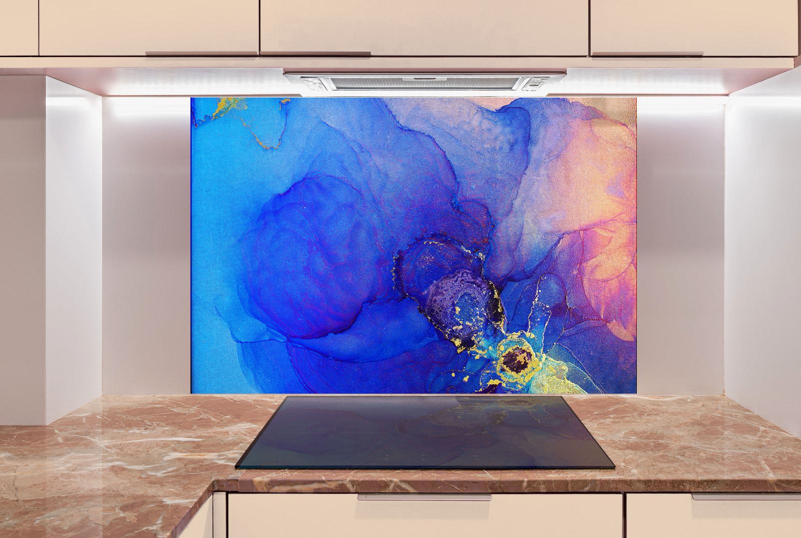 a kitchen counter with a large abstract painting hanging above it. The painting has a vibrant mix of blue, pink, and yellow colors, creating a lively and colorful atmosphere in the kitchen.