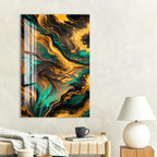 a large abstract painting with swirling patterns of green, yellow, and black colors hanging on a wall above a wooden table with a lamp and a coffee cup on it.