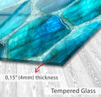 a close up of a piece of art on a wooden floor