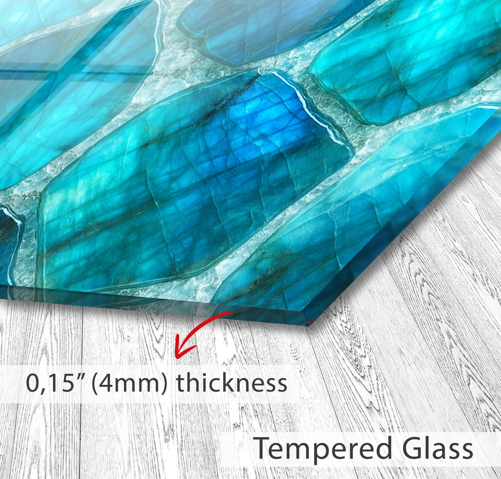 a close up of a piece of art on a wooden floor