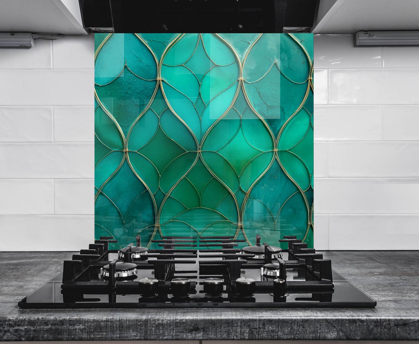 a stove top sitting in front of a green wall