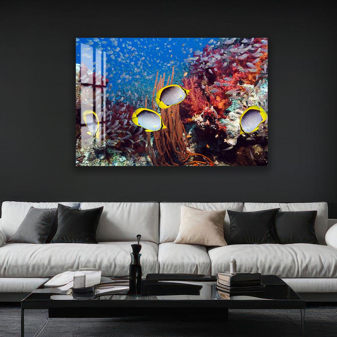 a large, vibrant painting of a coral reef with colorful fish swimming among the coral.