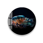 A round, glossy print depicting a jellyfish with a vibrant mix of colors, including shades of blue, orange, and green, floating against a dark background.
