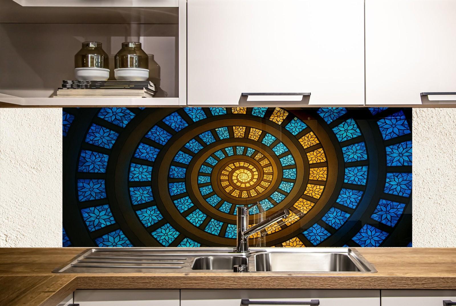 a kitchen sink under a stained glass window