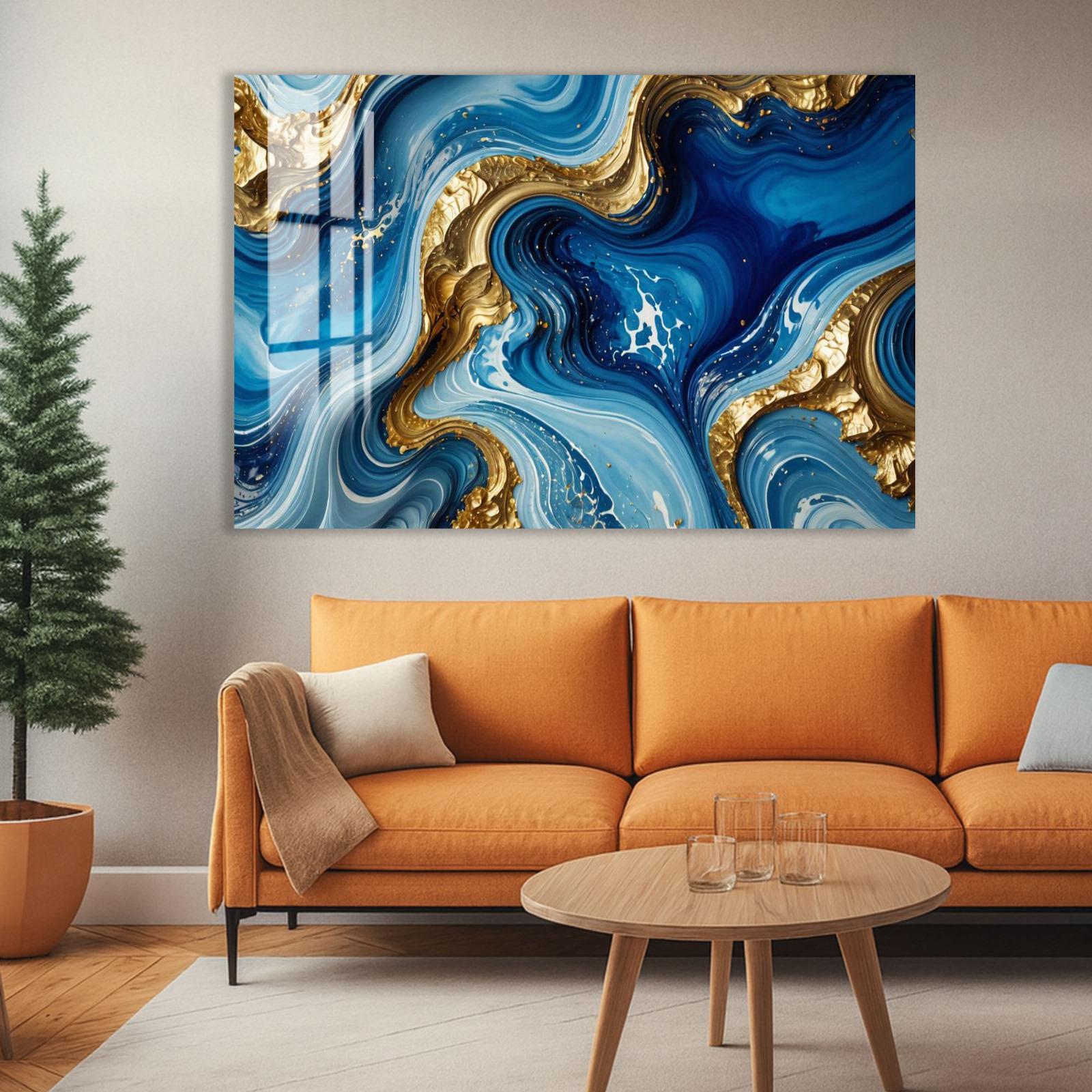 a modern living room with a large abstract painting hanging on the wall above a cozy orange sofa. The painting has swirling patterns of blue and gold colors, creating a visually striking and dynamic design. In front of the sofa, there is a wooden coffee table with a glass top, and a potted plant is placed on the floor next to the sofa.