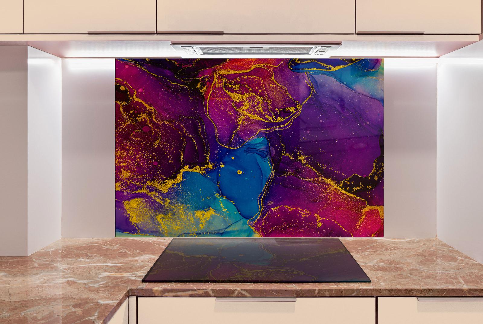 a kitchen counter with a large, colorful abstract painting hanging above it. The painting has a vibrant mix of purple, blue, and yellow colors, creating a lively and dynamic visual effect. The kitchen counter appears to be made of marble, adding a touch of elegance and sophistication to the space.