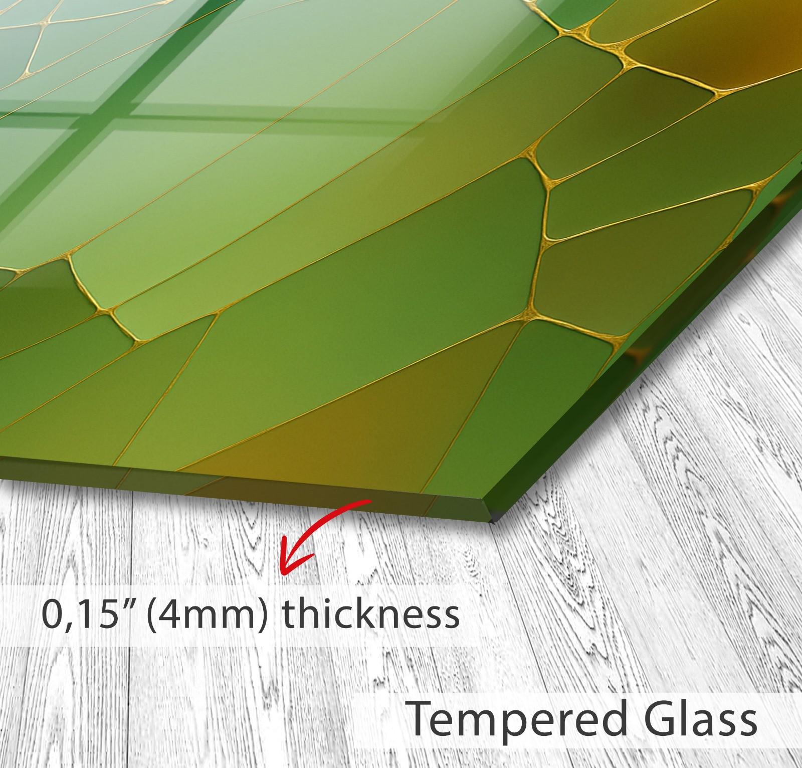 a close up of a piece of glass on a wooden floor