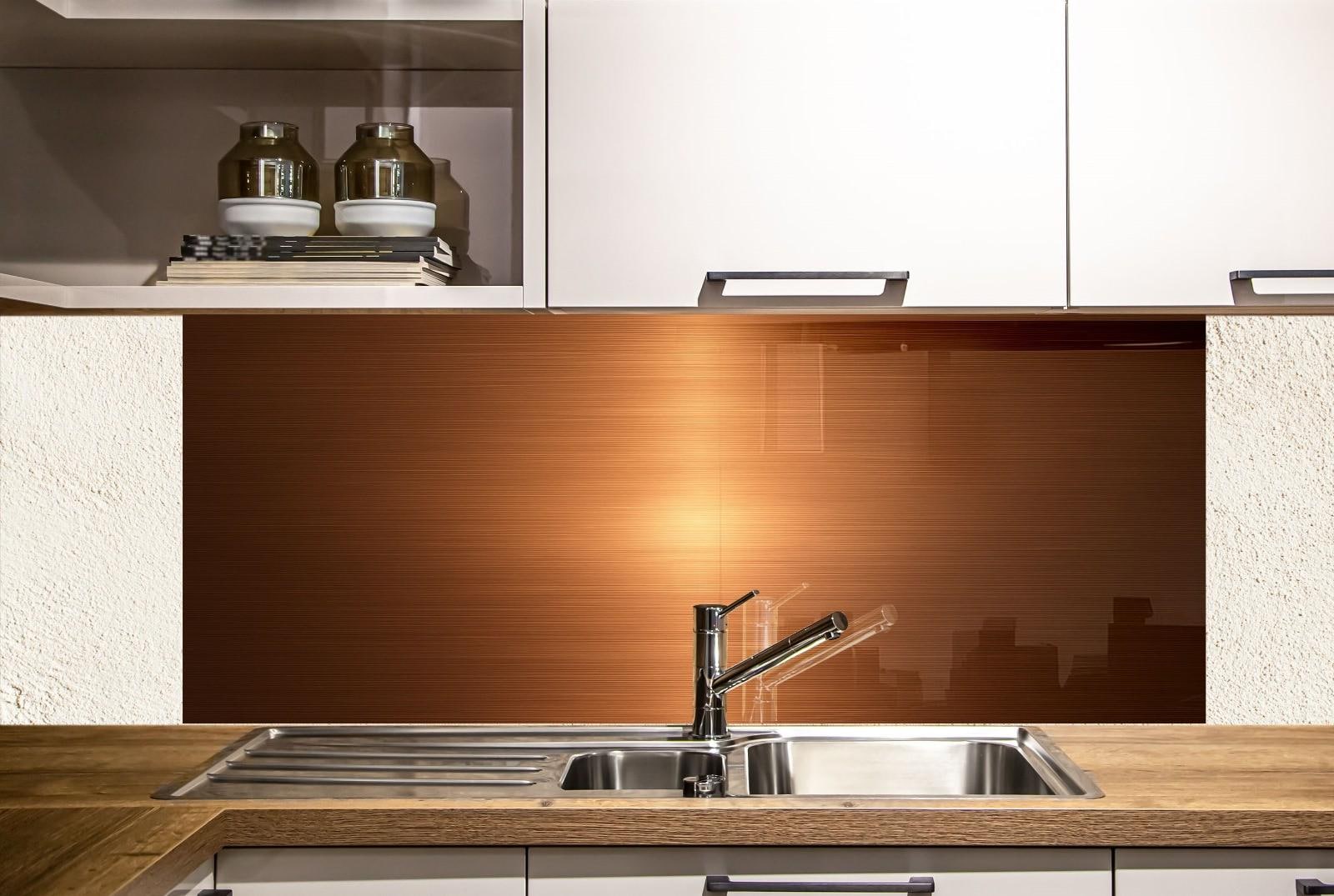 a kitchen with a sink and a wooden counter top