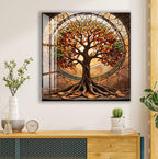 a large, colorful stained glass tree with a brown trunk and vibrant leaves, set against a brown background with a circular window. The tree is surrounded by a variety of plants and decorative items, including a clock, a vase, and a stack of books.