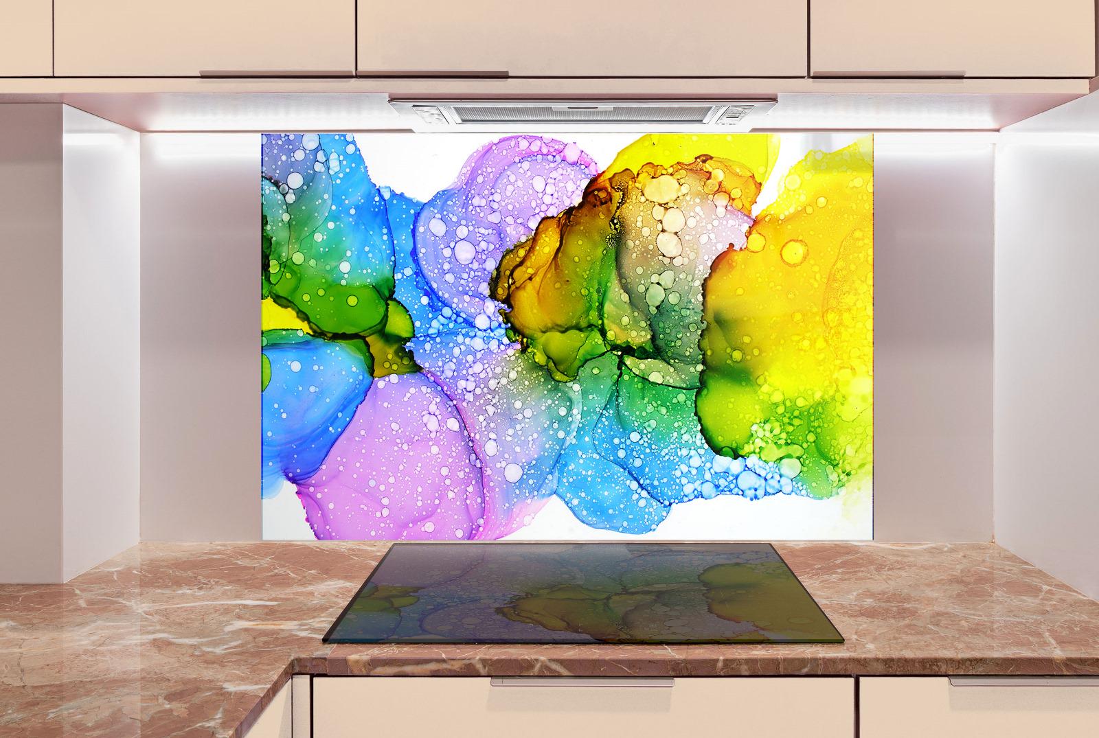 a vibrant abstract painting with a variety of colors and shapes, displayed on a wall in a kitchen setting.