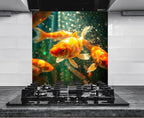 a group of gold fish swimming in an aquarium