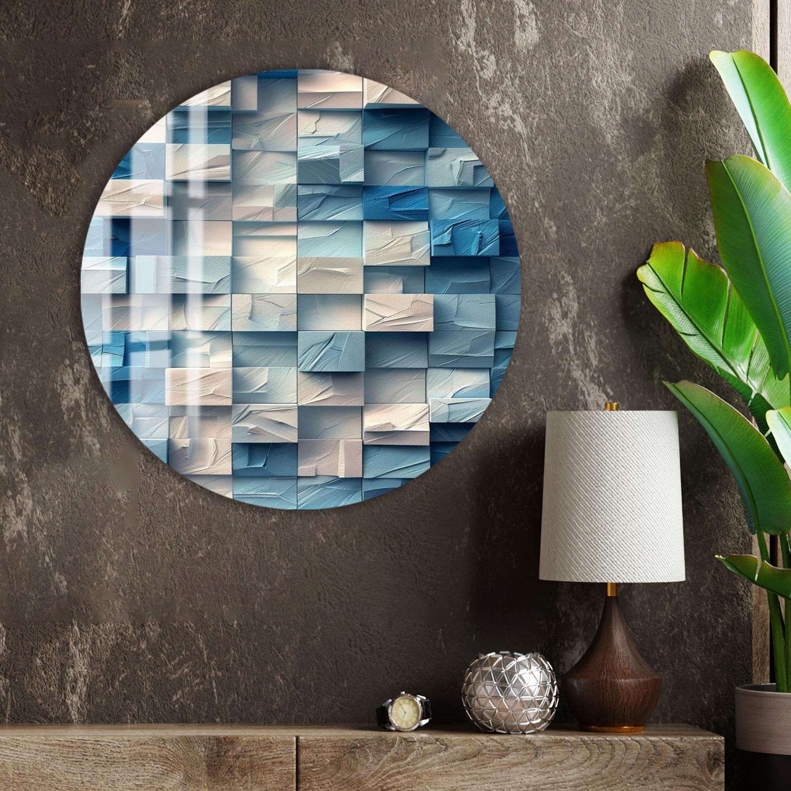 a modern interior design with a large circular wall art piece depicting a geometric pattern in shades of blue and white. The art piece is mounted on a textured wall, and the room includes a wooden shelf with a lamp, a plant, and a small metal ball.
