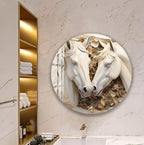 a large circular wall art depicting two white horses with a floral design, mounted on a marble wall.
