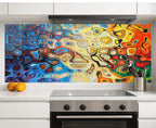 a vibrant, abstract painting with swirling patterns of blue, orange, yellow, and red colors, creating a dynamic and energetic visual effect. The painting is displayed on a wall above a kitchen stove, which has a stainless steel oven and a silver pot on the countertop.