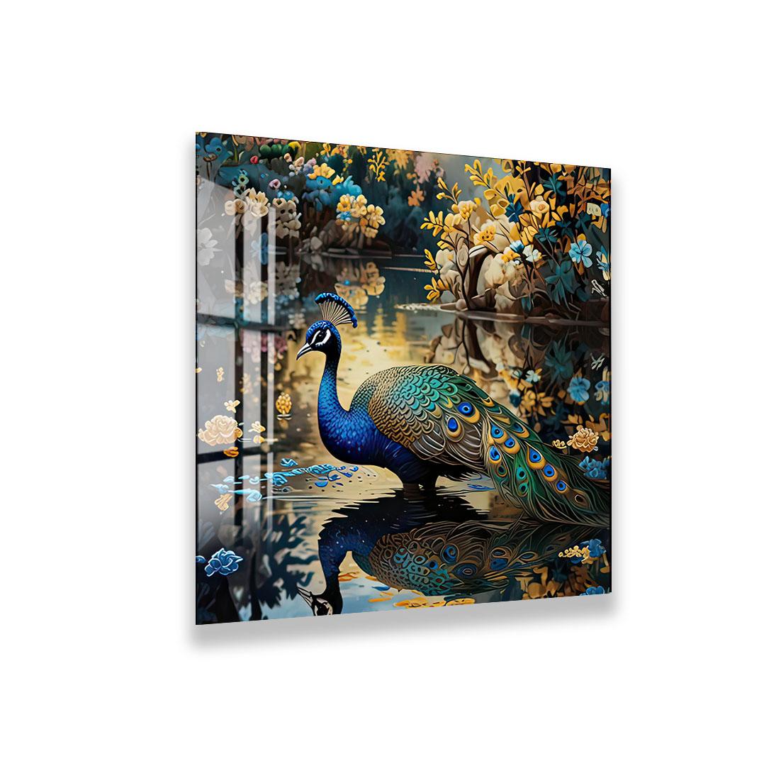 A peacock standing in a pond surrounded by colorful flowers and foliage.