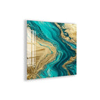The image is a vibrant abstract painting with a striking combination of turquoise and gold colors. The painting features swirling patterns and textures that create a sense of movement and energy. The colors are bold and eye-catching, making the artwork visually appealing and captivating.